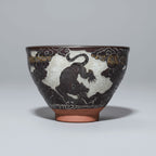Carving on Porcelain Tea Bowl Tiger
